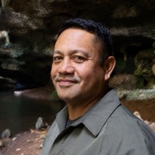 Hemi Williams, Waitomo cave guide, photographed at a limestone cave mouth in the Waitomo district